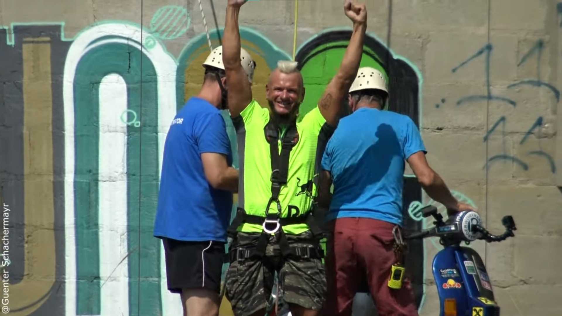 gunter-schachermayr-riding-vespa-down-chimney (1)